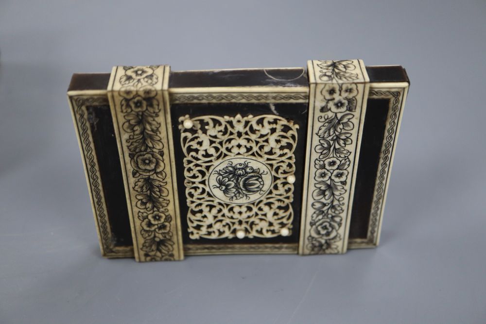 A 19th century Southern Indian horn and ivory mounted trinket box, height 7.5cm and a similar card case